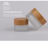 Hot sale cosmetic face cream container 5ml 15ml 30ml 50ml 100ml frosted clear glass jar with bamboo wood lid