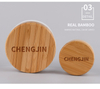 Hot sale cosmetic face cream container 5ml 15ml 30ml 50ml 100ml frosted clear glass jar with bamboo wood lid