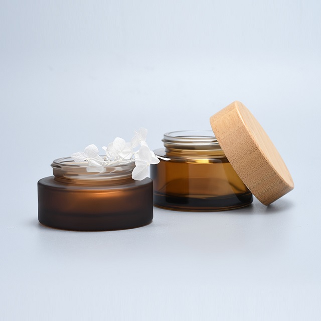 Hot sale cosmetic face cream container 5ml 15ml 30ml 50ml 100ml amber frosted glass jar with bamboo wood lid