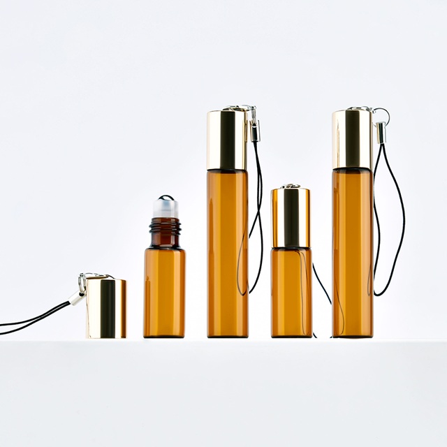 5ml Amber Glass Rollerball Bottle with Custom Logo & Keychain Travel Size Essential Oil Perfume Sample Bottle for OEM/ODM