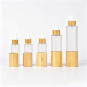 Luxury 30ml 50ml 100ml Empty Skincare Lotion Cream Glass Spray Round Frosted clear Cosmetic Bottle Packaging with bamboo Pump lid