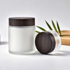 30ml 50ml 100ml Clear Amber Black Empty Eye Face Cream Moisturizer Container Glass Cosmetic Jar With Bamboo Wood Plastic Lid