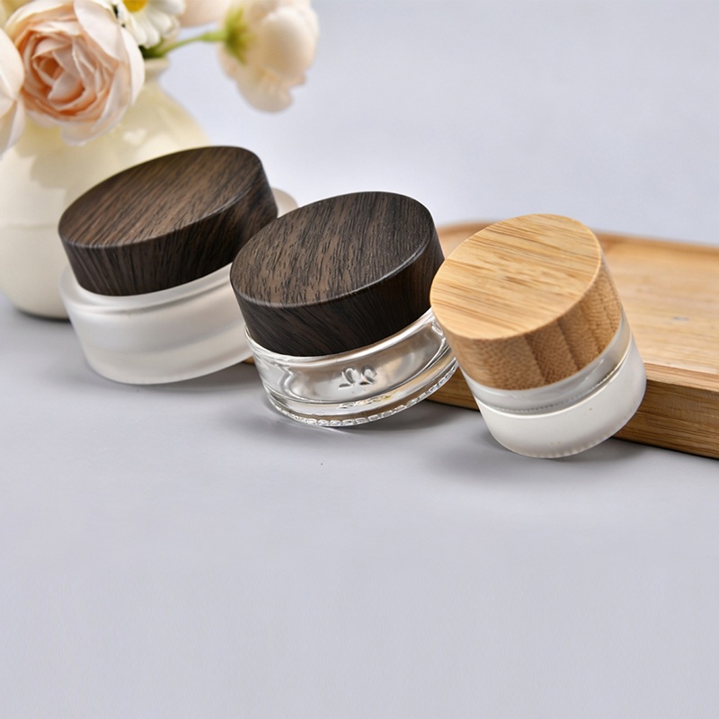 30ml 50ml 100ml Clear Amber Black Empty Eye Face Cream Moisturizer Container Glass Cosmetic Jar With Bamboo Wood Plastic Lid