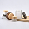 30ml 50ml 100ml Clear Amber Black Empty Eye Face Cream Moisturizer Container Glass Cosmetic Jar With Bamboo Wood Plastic Lid