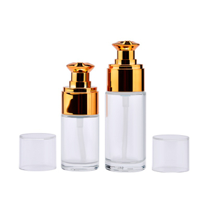 Flat shoulder glass pump bottle